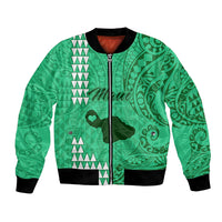 Green unisex bomber jacket with tribal patterned zip front and ribbed black cuffs