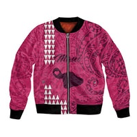 Pink bomber jacket with tribal Polynesian print, front zipper, and black ribbed trim.