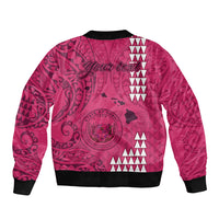 Pink bomber jacket back with bold tribal pattern, black ribbed hem and cuffs.