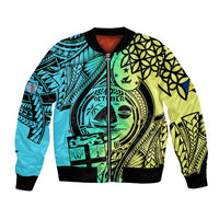 Unisex bomber jacket with black ribbed collar, teal and lime Polynesian print zip front