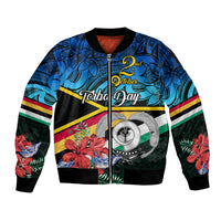 Zip-up bomber jacket with black ribbed trim, blue tropical Polynesian graphic front
