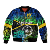 Unisex Malampa bomber jacket on black, blue-green tribal floral graphic with emblem.