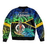 Unisex Malampa bomber jacket on black, blue-green tribal floral print with emblem circle.
