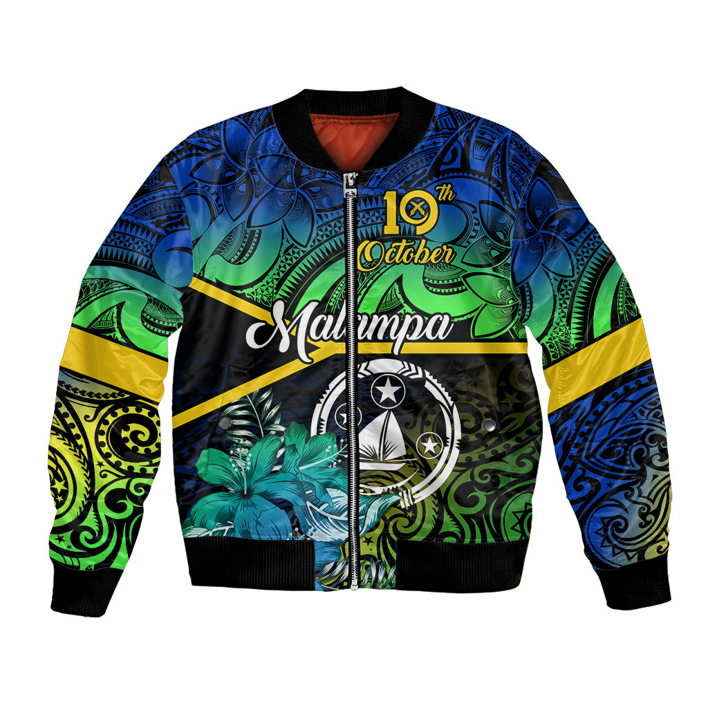 Black bomber jacket with blue-green tribal floral print, front zipper, emblem patch