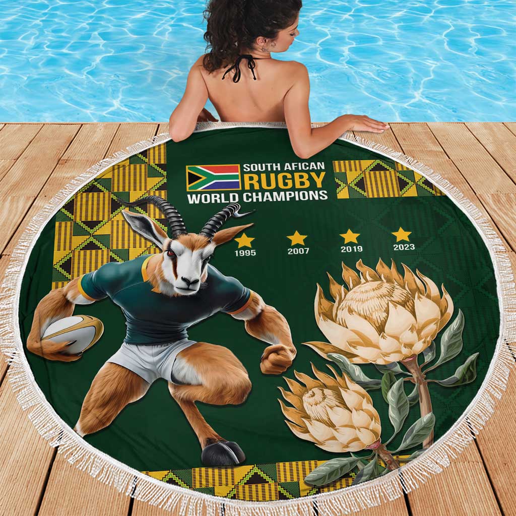 Green round beach blanket with fringe edge, rugby world champions logo and protea design