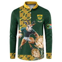 Green rugby-style button sweatshirt with yellow collar, Springboks logo and animal-flower print