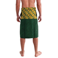 Green lavalava with yellow geometric border and matching patterned lower panel