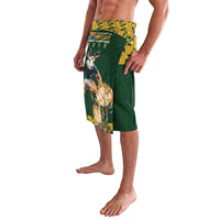 Green lavalava with rugby emblem, animal figure, and yellow patterned top panel
