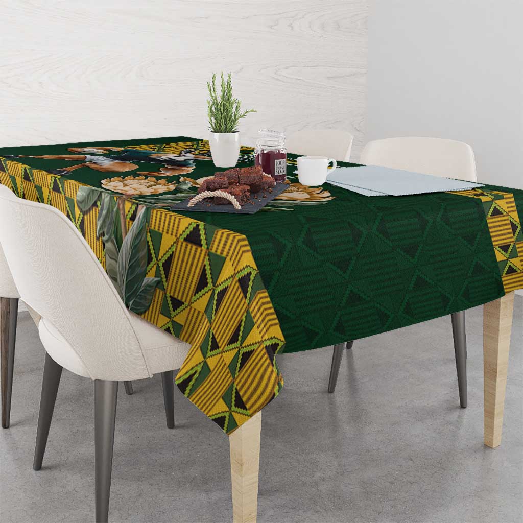 Green tablecloth with yellow geometric borders and a draped corner