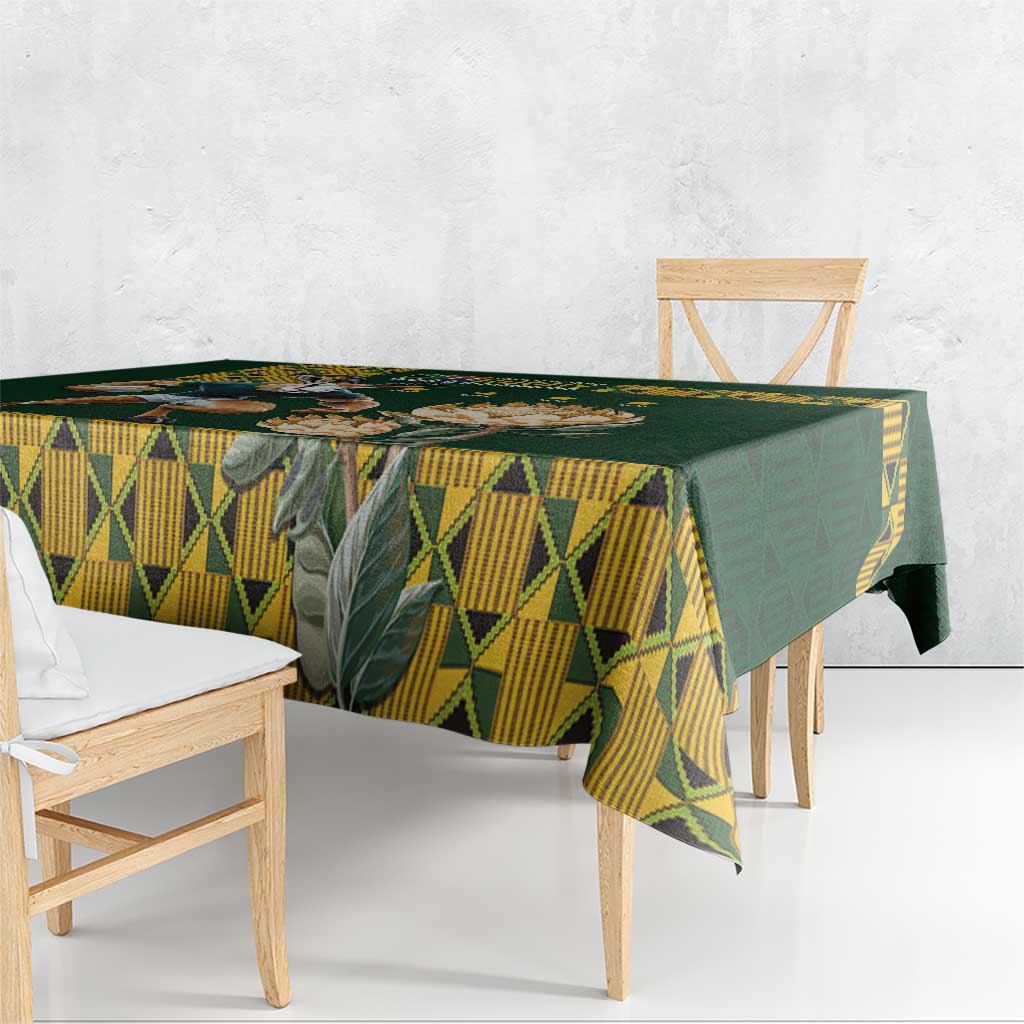 Green tablecloth with yellow triangular geometric design