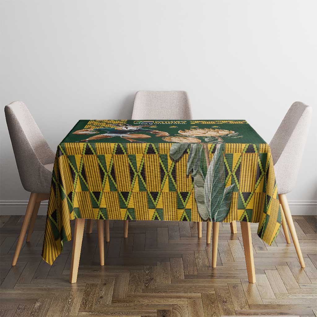 Green tablecloth with yellow geometric grid pattern and banner strip