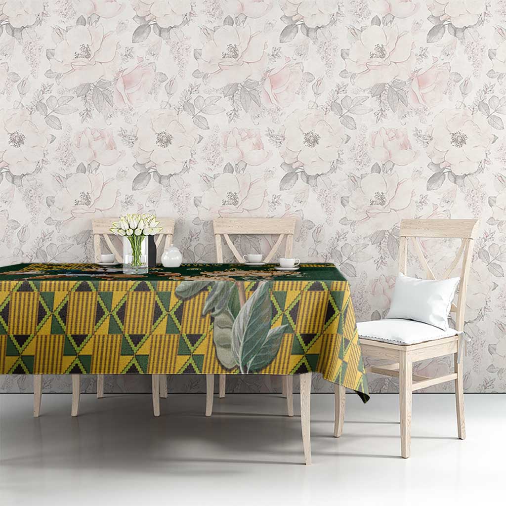 Green tablecloth with yellow geometric pattern on a dining table