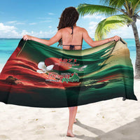 Green personalized sarong with flag artwork and 1971 text, tied at back