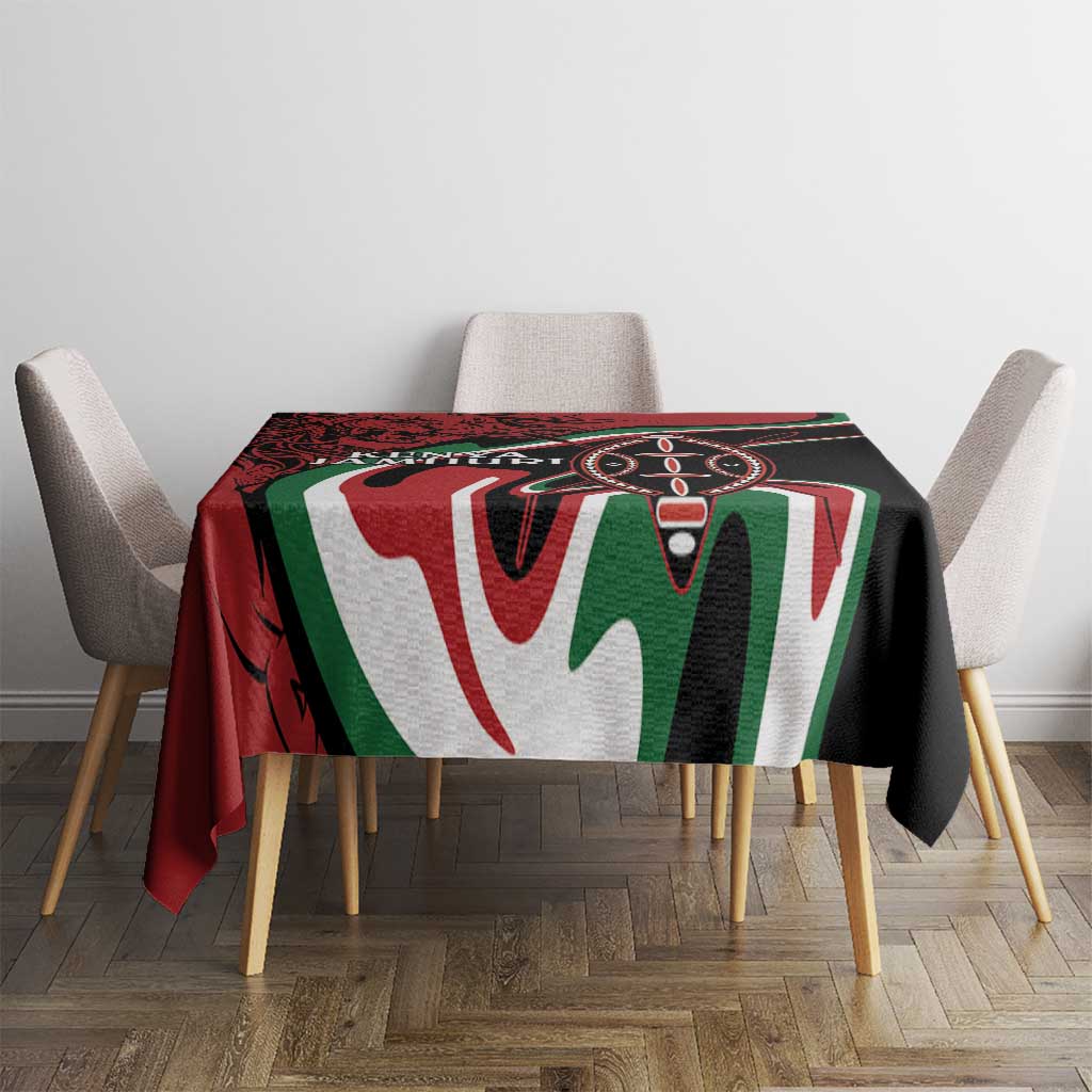 Tablecloth on a dining table with red and black base, green and white emblem-style shapes