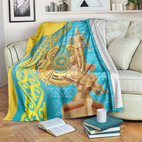 Gold and blue decorative throw blanket with golden warrior graphic and ornate border