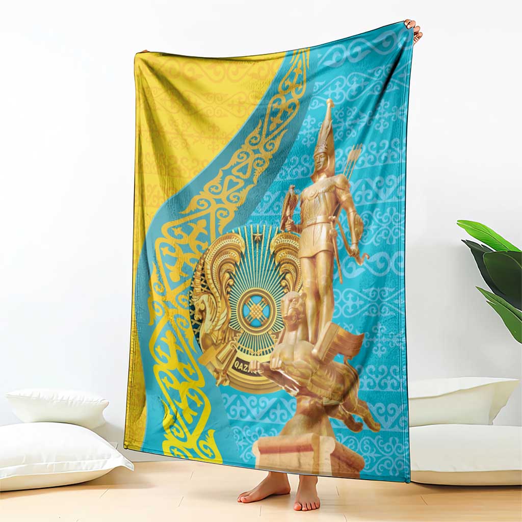 Gold, teal, and blue throw blanket with golden warrior statue graphic, corner view