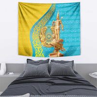 Wall tapestry featuring gold warrior statue on blue and gold patterned background