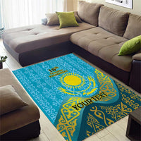 Blue and gold decorative area rug with sun emblem and “YOUR TEXT” across the center
