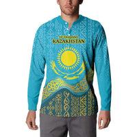 Blue button sweatshirt front with Kazakh pattern, sun emblem, and KAZAKHSTAN text
