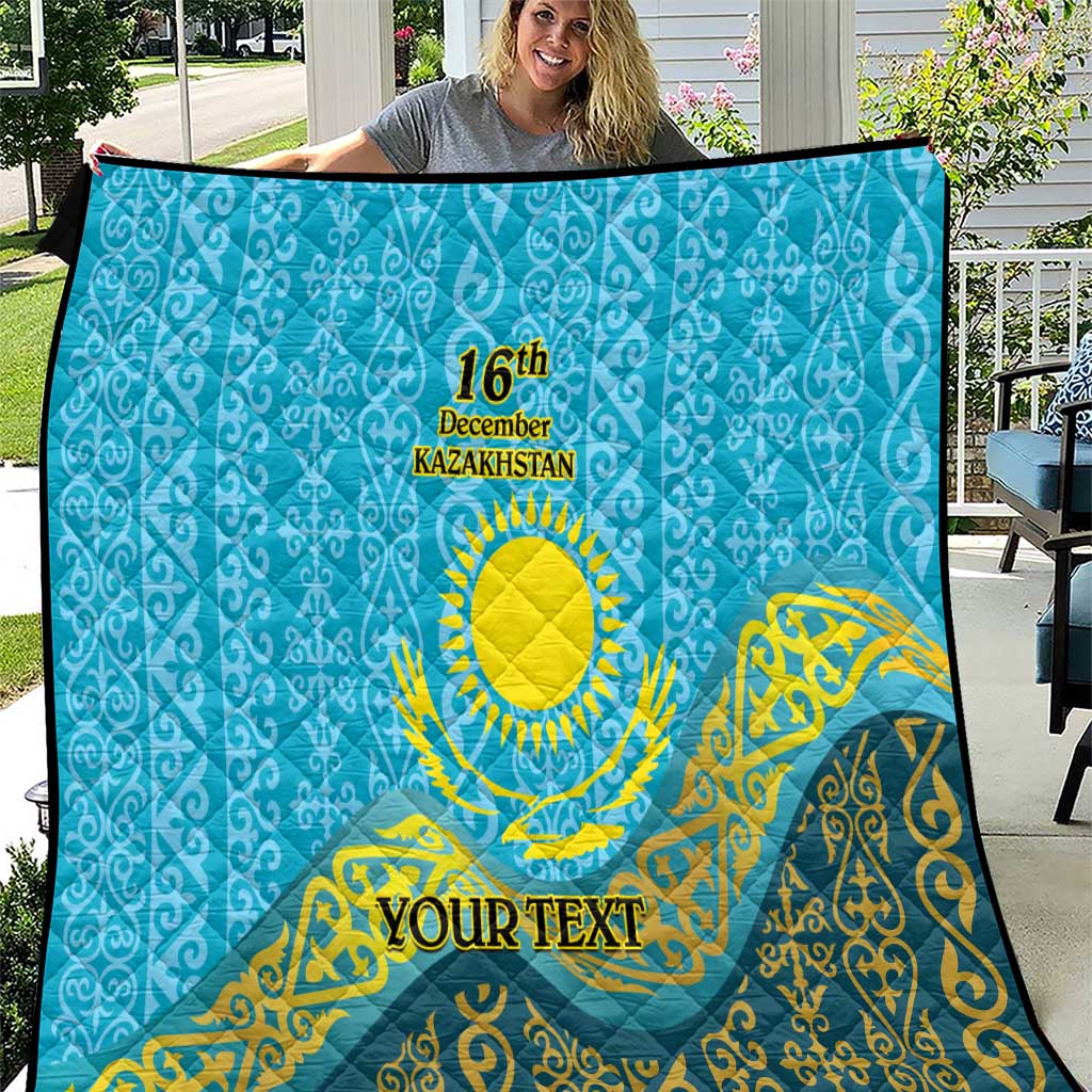 Blue quilt with yellow Kazakh ornament, “16th December Kazakhstan,” and “YOUR TEXT”