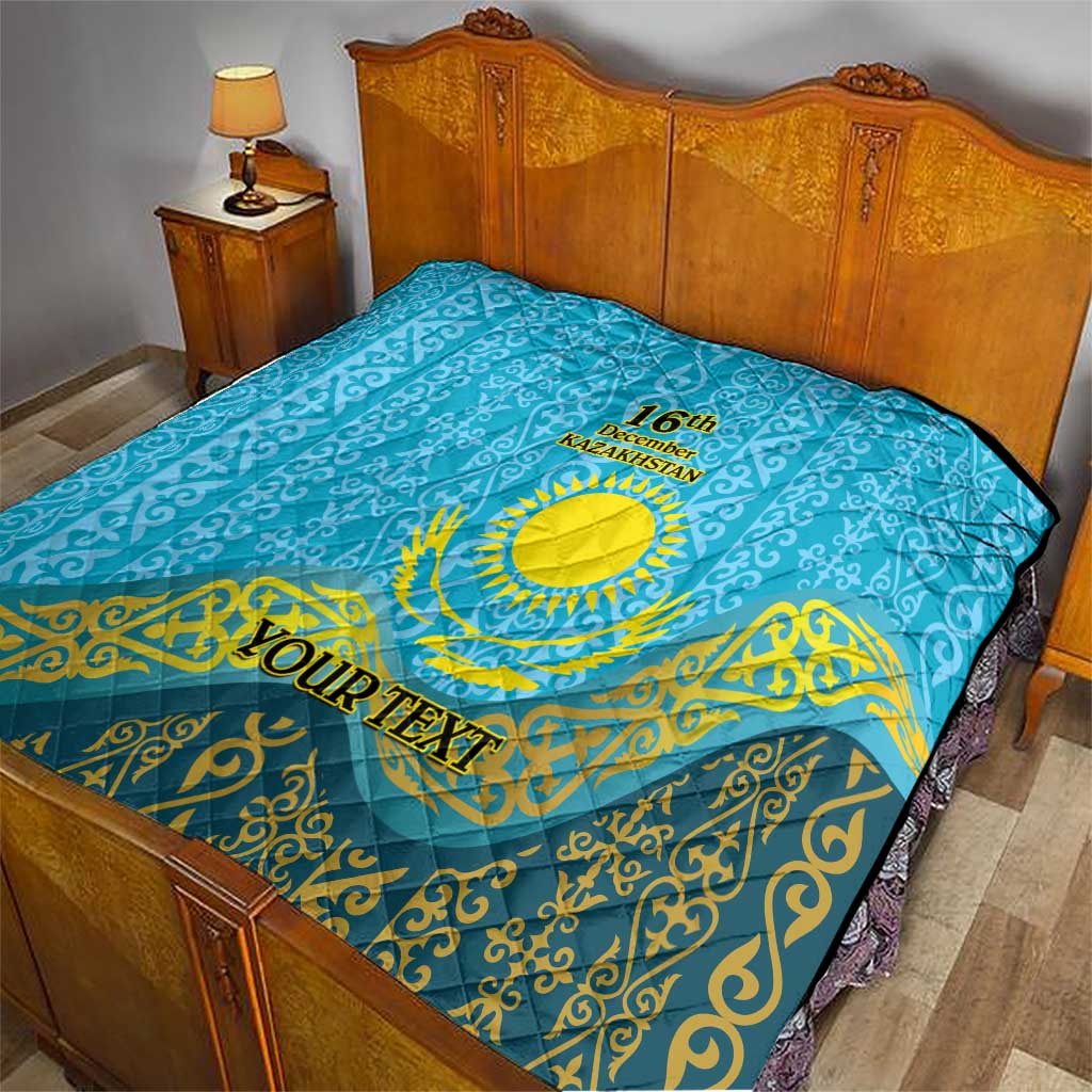 Blue bed quilt with yellow Kazakh design, “16th December Kazakhstan,” and “YOUR TEXT”