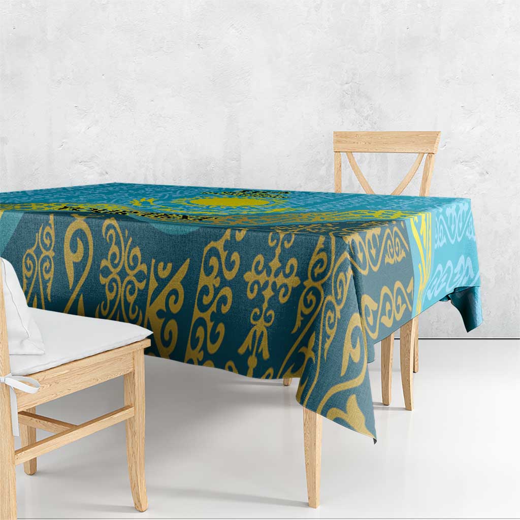 Blue tablecloth with repeating gold ornament pattern hanging over table edge