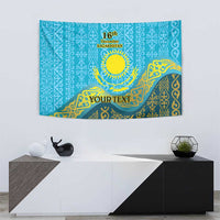 Blue tapestry wall hanging with gold Kazakh pattern, sun emblem, '16th December' and 'YOUR TEXT'.