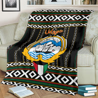 Black decorative personalized blanket featuring central emblem, red script, and geometric border.