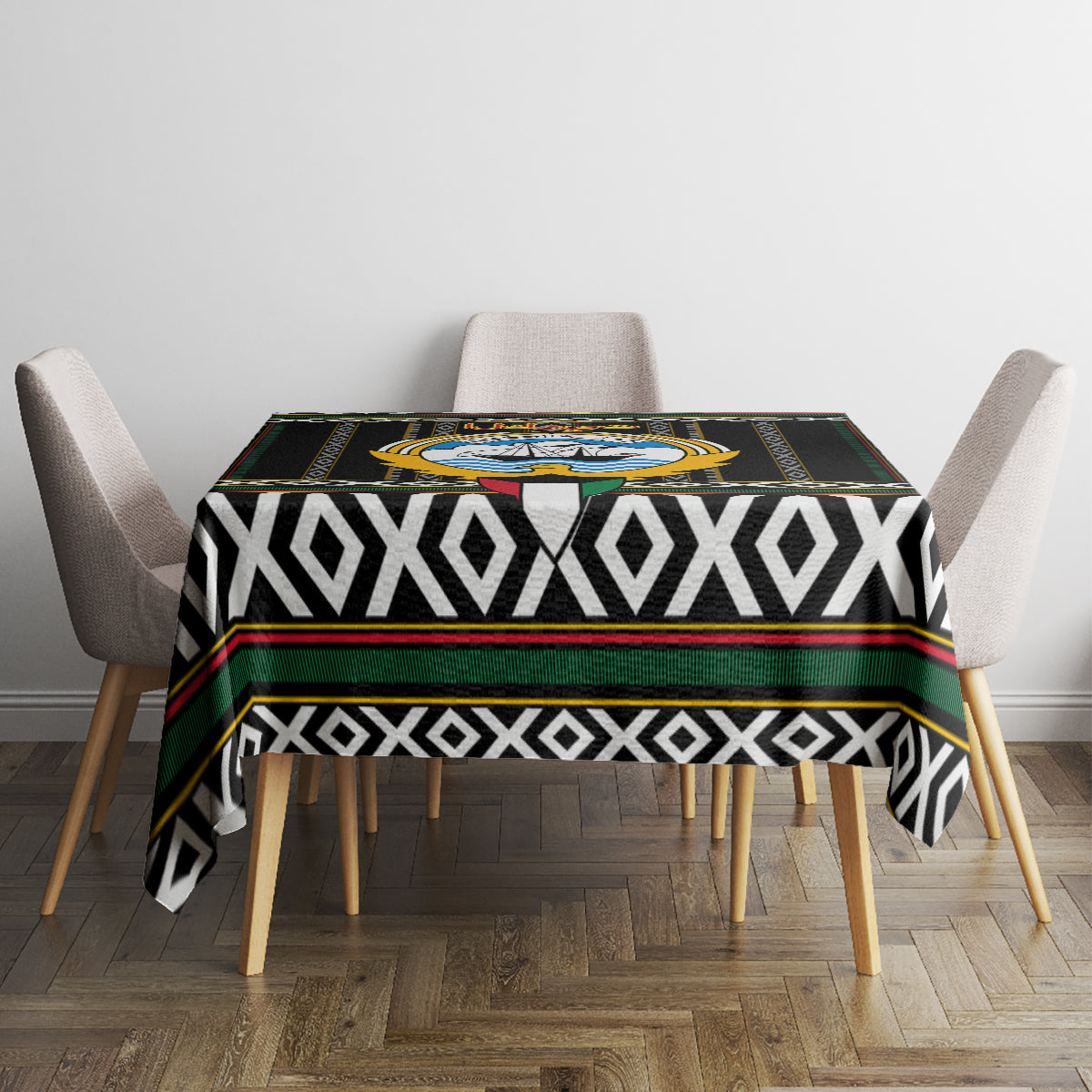 Black tablecloth with geometric diamond pattern panel and red-green border
