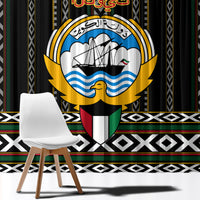 Black curtain with large circular hawk-style emblem and striped Al Sadu bands across hem.