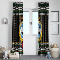 Pair of black window curtains with geometric borders and central circular hawk-style emblem.