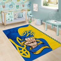 Blue and gold folk Unity area rug with clasped hands, blue ribbon, and trident motif