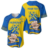Personalized gold and blue baseball jersey shown front and back with folk pattern and raised fist