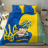 Blue and yellow bedding set with two pillows, trident emblem, and bold folk pattern on duvet