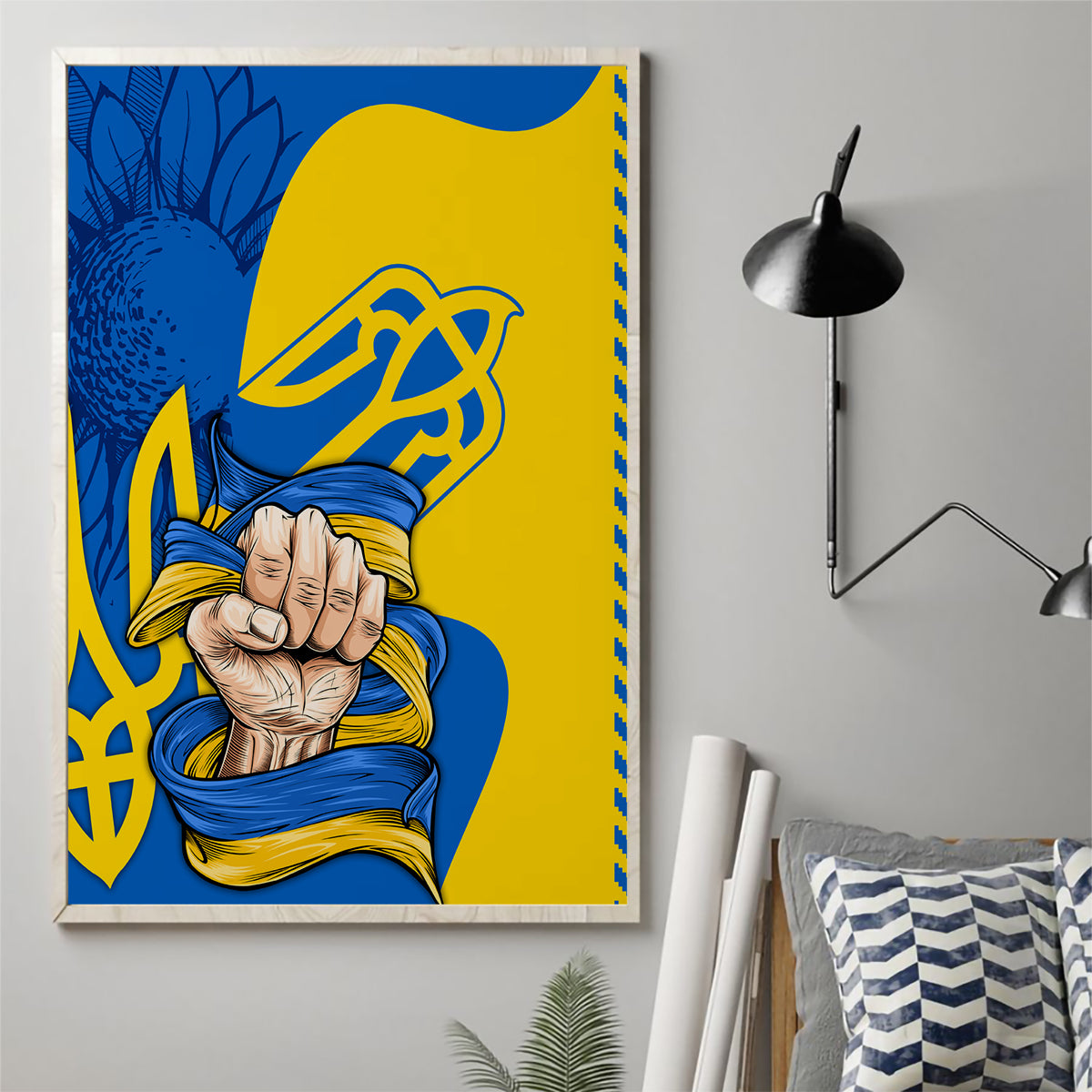 Unframed canvas wall art showing blue and yellow clenched-hands folk emblem