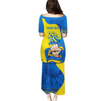 Blue and yellow long dress, back view, folk graphic print with placeholder text
