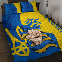Personalized folk quilt bed set with blue and yellow quilt and two matching pillows