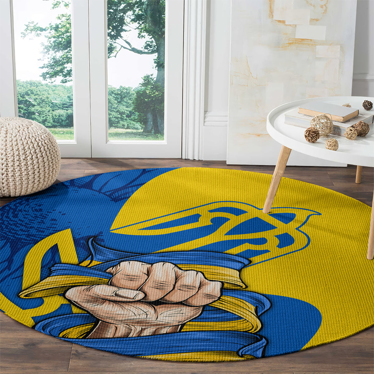 Round area rug with yellow center and blue sides, clenched fist and trident emblem