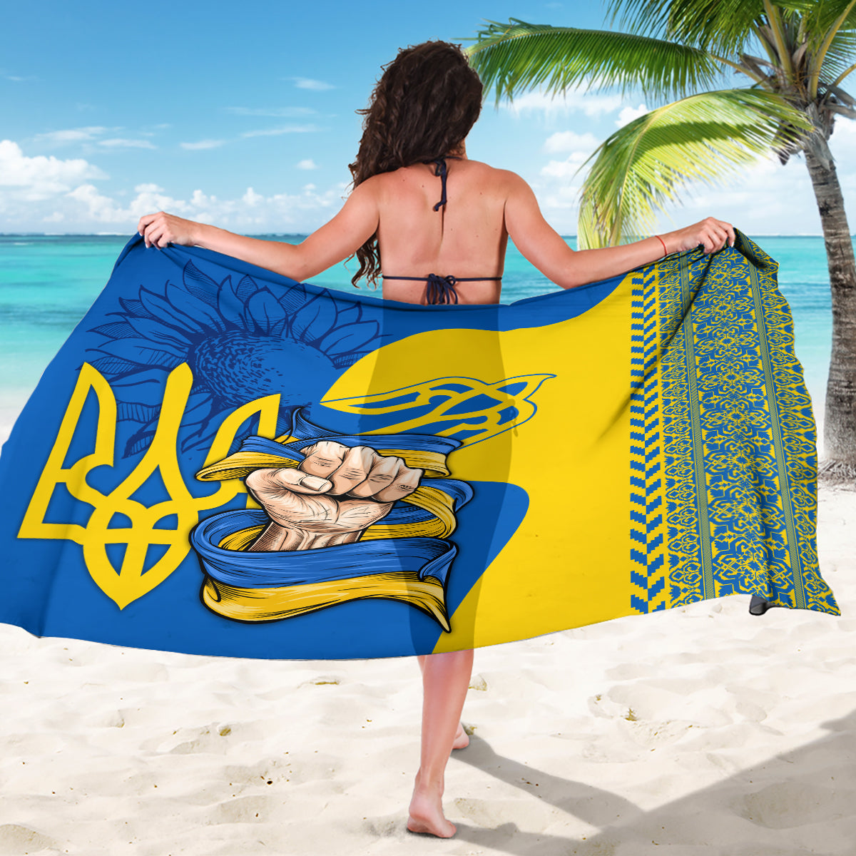 Blue and yellow folk pattern sarong with large emblem and decorative border