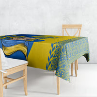 Rectangular tablecloth draped over table with blue, gold, and ornate border print