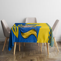 Tablecloth with blue and gold folk motif centerpiece panel and patterned border