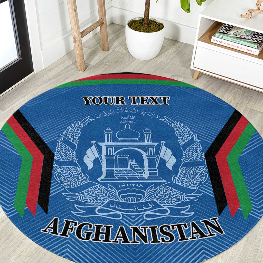Blue round rug with Afghanistan emblem, AFGHANISTAN text, and red green chevron border