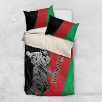 Cricket bedding set laid flat: duvet and pillow covers in black, red, and green.