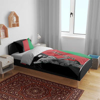 Cricket bedding set on a bed with black, red, and green duvet featuring player artwork.