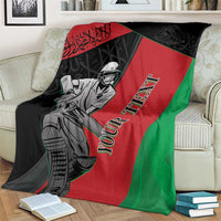 Afghanistan cricket blanket over sofa, tricolor panel design with cricket player print