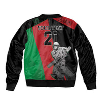 Unisex bomber jacket back, black with red/green diagonal panels, YOUR TEXT and cricket batsman