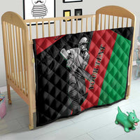 Quilted Afghanistan cricket blanket with black, red, and green colors and player illustration