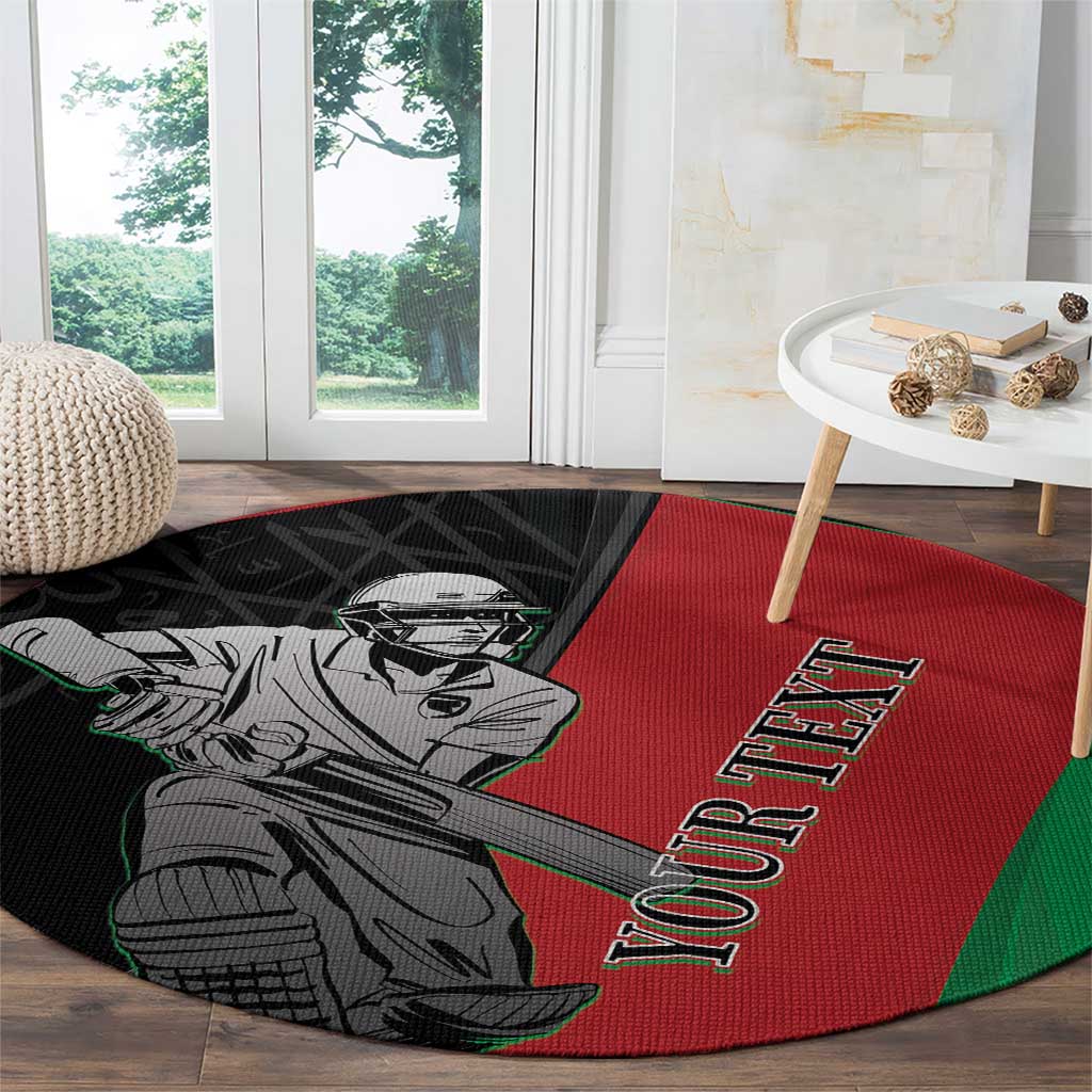 Round carpet with red center, green edge band, black corner panel, cricket player design