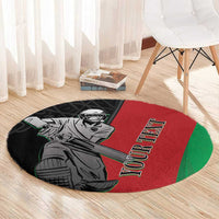 Round carpet with black border, red center, green accent edge, cricket player artwork