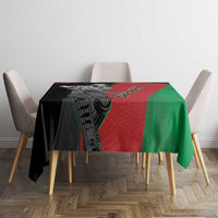 Custom Afghanistan cricket tablecloth on table: black, red panel stripe, and green side section